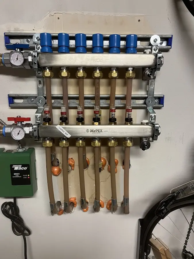 Plumber performing Gas Leak Detection at a residential property in Woods Cross